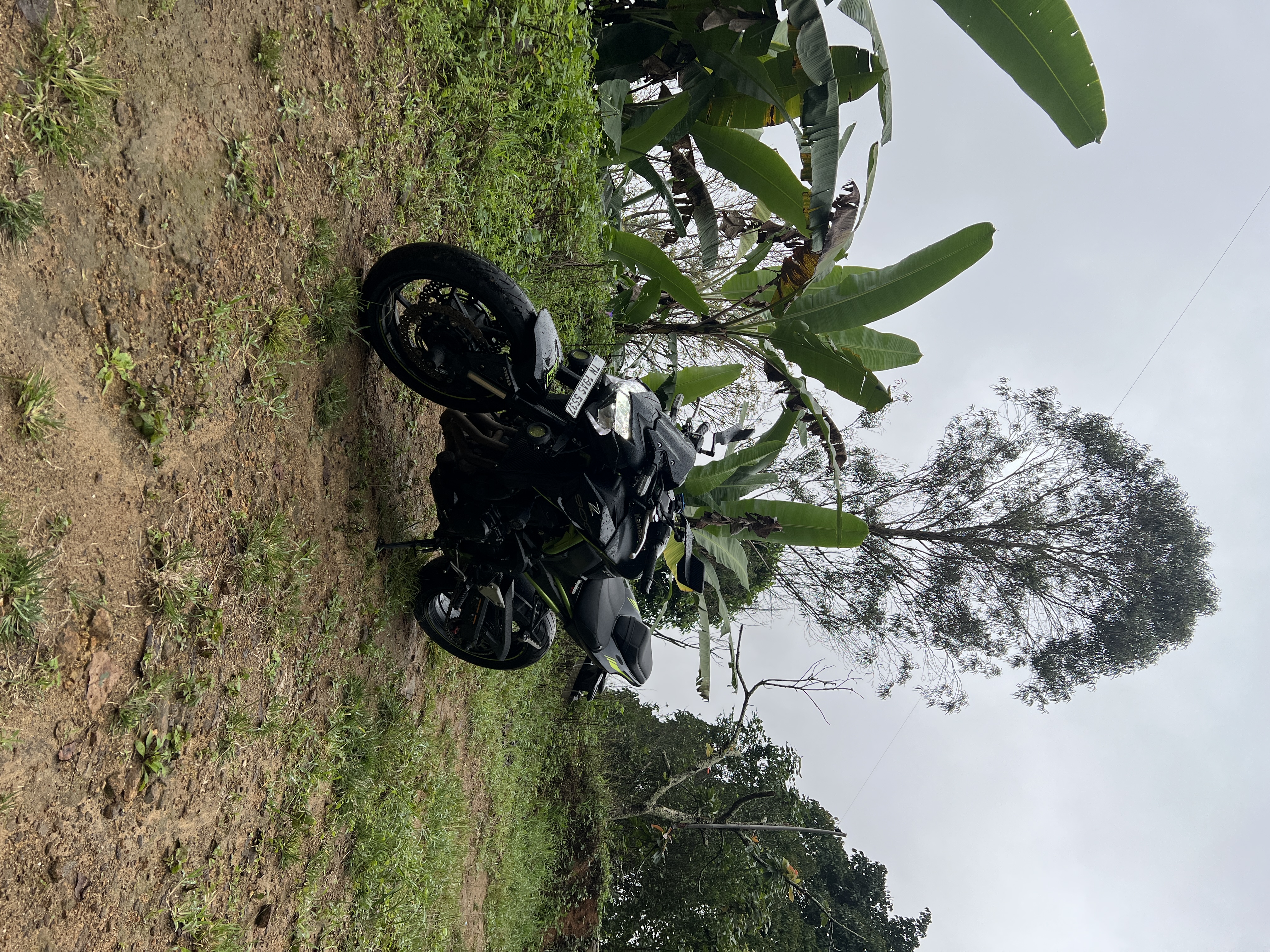 Motorcycle parked on a Kodaikanal trail